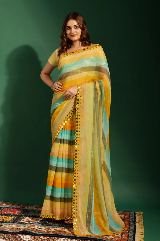 Woman wearing a colorful striped saree against a green background Glanzavi