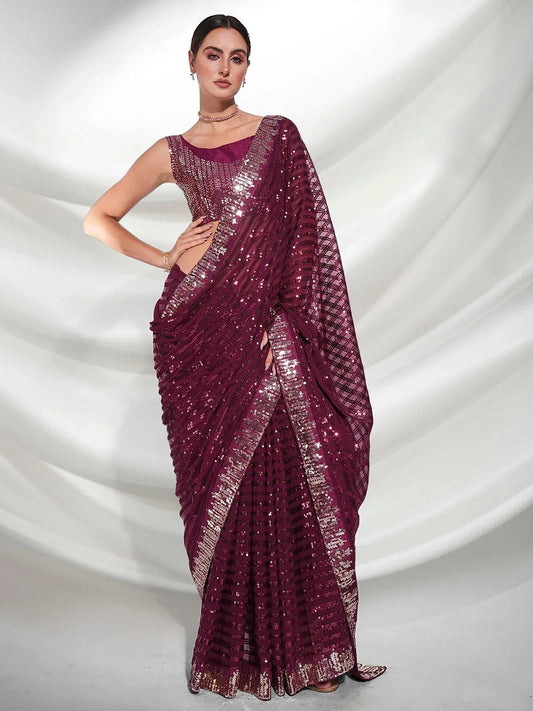 Woman wearing a purple saree with silver border on a white background Glanzavi