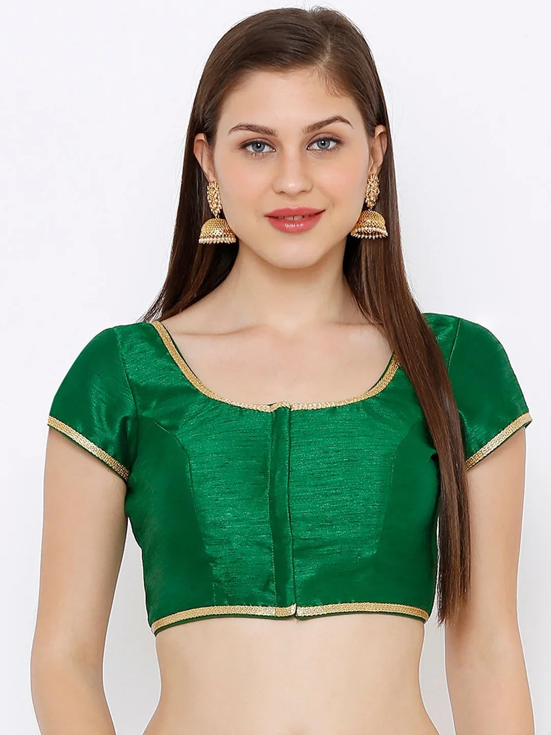 Woman wearing a green blouse with gold trim on a white background Glanzavi