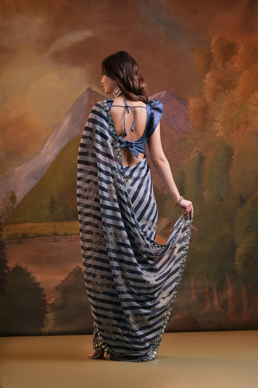 Woman in a striped dress with a scenic background Glanzavi