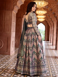 Aarvi Dusty Mauve & Bottle Green Banarasi Silk Lehenga Set with Zari Woven Patterns