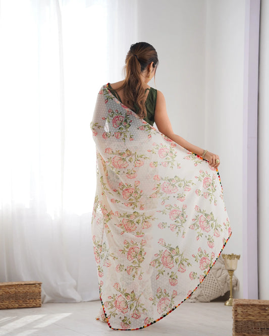 Woman wearing a floral saree in a minimalistic room Glanzavi