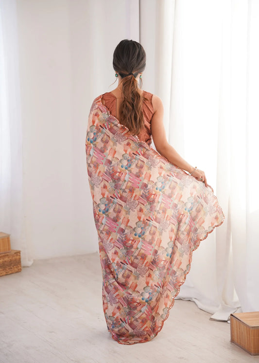 Woman holding a floral saree in a minimal indoor setting Glanzavi
