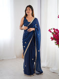 Flora Teal Blue Floral Embellished Net Saree with Gold Border