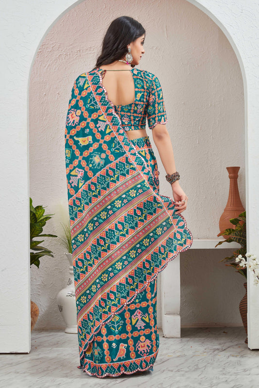 Woman wearing a colorful saree with a pattern in a minimalistic setting Glanzavi