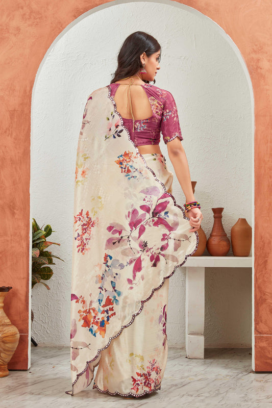 Woman wearing a floral saree with a blurred background Glanzavi