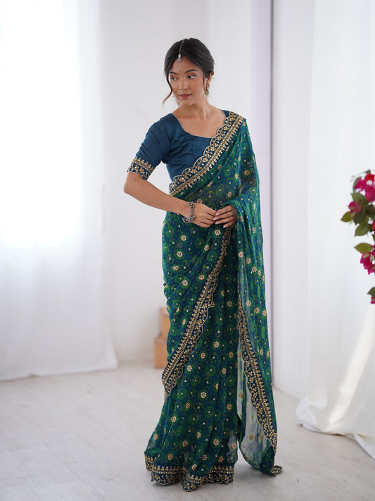 Teal Blue Printed Georgette Saree Gold Embroidered Border