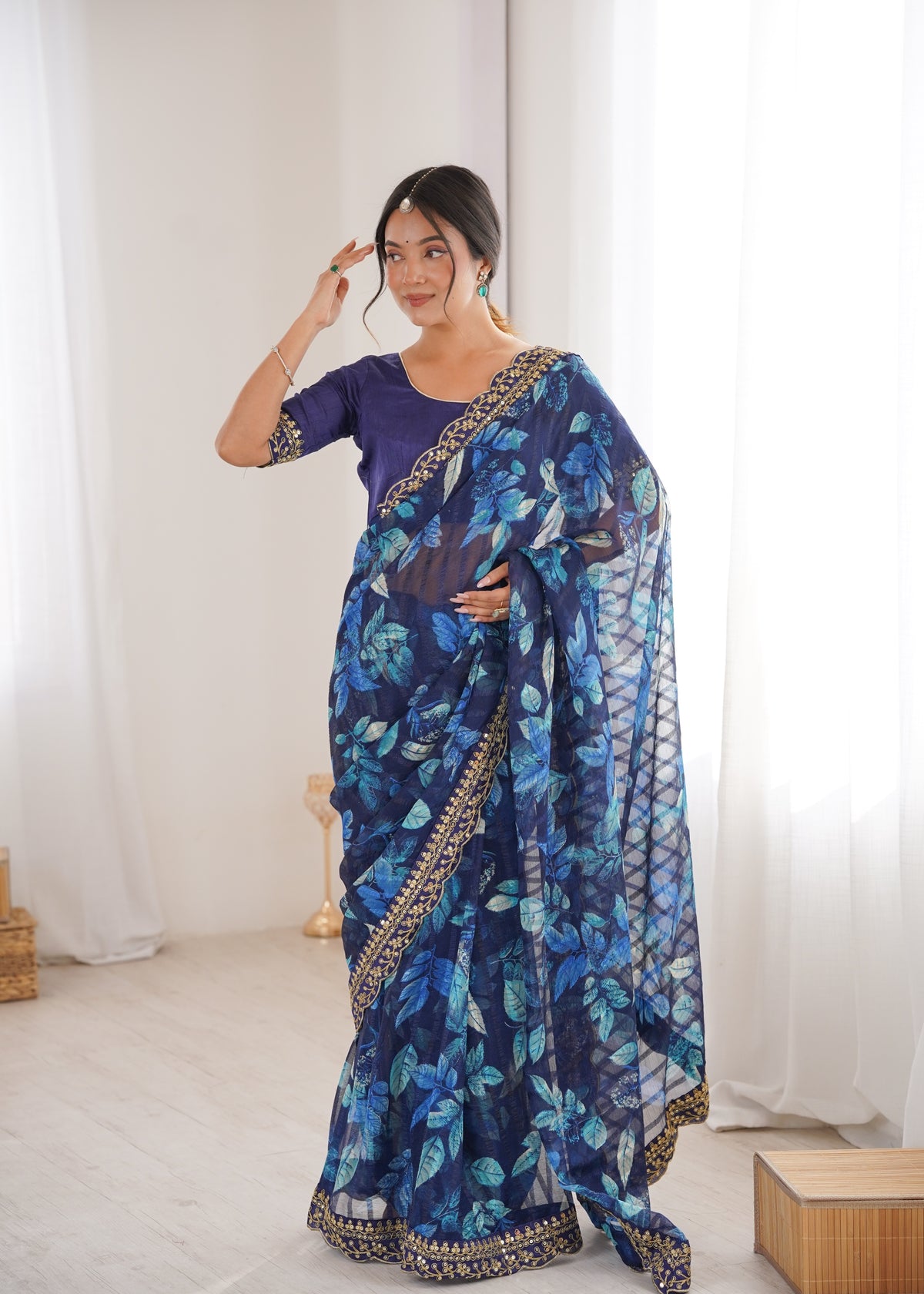 Blue Printed Georgette Saree with Gold Embroidered Border