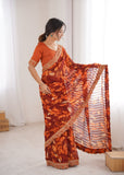 Orange Printed Georgette Saree with Gold Embroidered Border